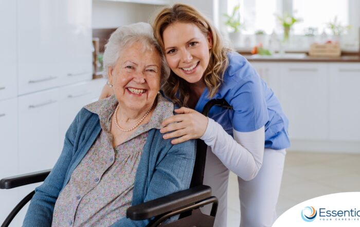 A caregiver enjoys her job as she smiles with a happy client representing the joy that can come from a home care career.